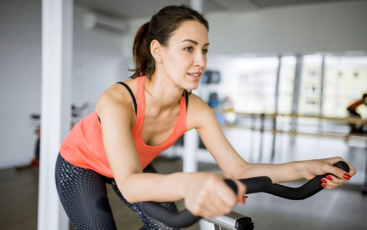 What are the benefits of riding an exercise bike